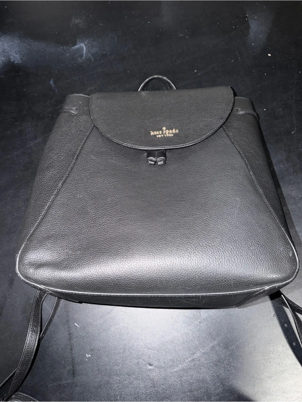 kate spade Black Pebbled Leather Backpack with Gold Logo